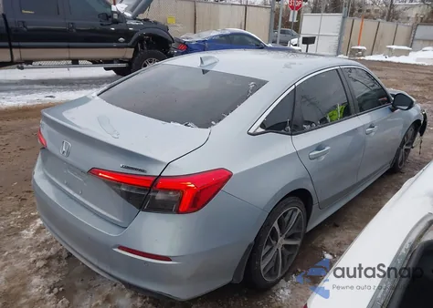 2022 Honda Civic Touring z USA, uszkodzony, nr VIN 2HGFE1F98NH300901